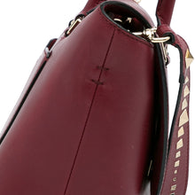Valentino | Pre-Owned Rockstud Demilune Satchel | Red
