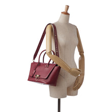 Valentino | Pre-Owned Rockstud Demilune Satchel | Red