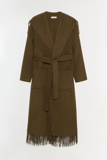 Olive-brown wool coat with wide collar, fringe trim on shoulders and hem, tied waist belt, and front pockets.