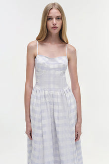 White and lavender gingham cotton midi dress with thin straps and pleated skirt.