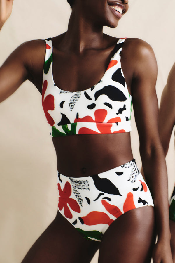 image of a woman wearing the M.M.LaFleurxAndie Portofina Bikini Bottom in cutout floral | Exclude