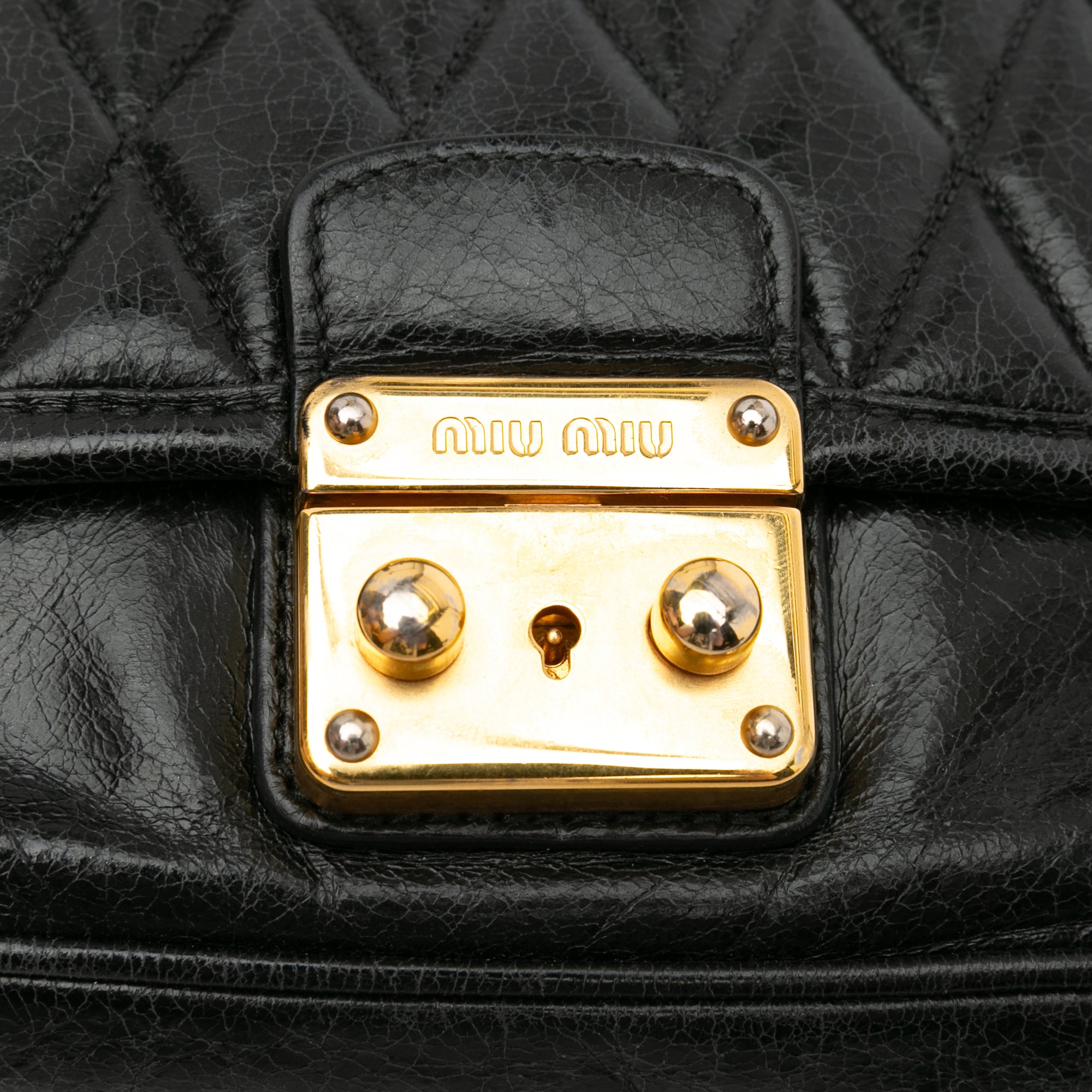 Miu Miu | Pre-Owned Vitello Shine Trapu Clutch | Black
