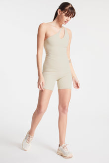 Bandier | Asymmetric Tempo Short Catsuit | Pumice Stone
