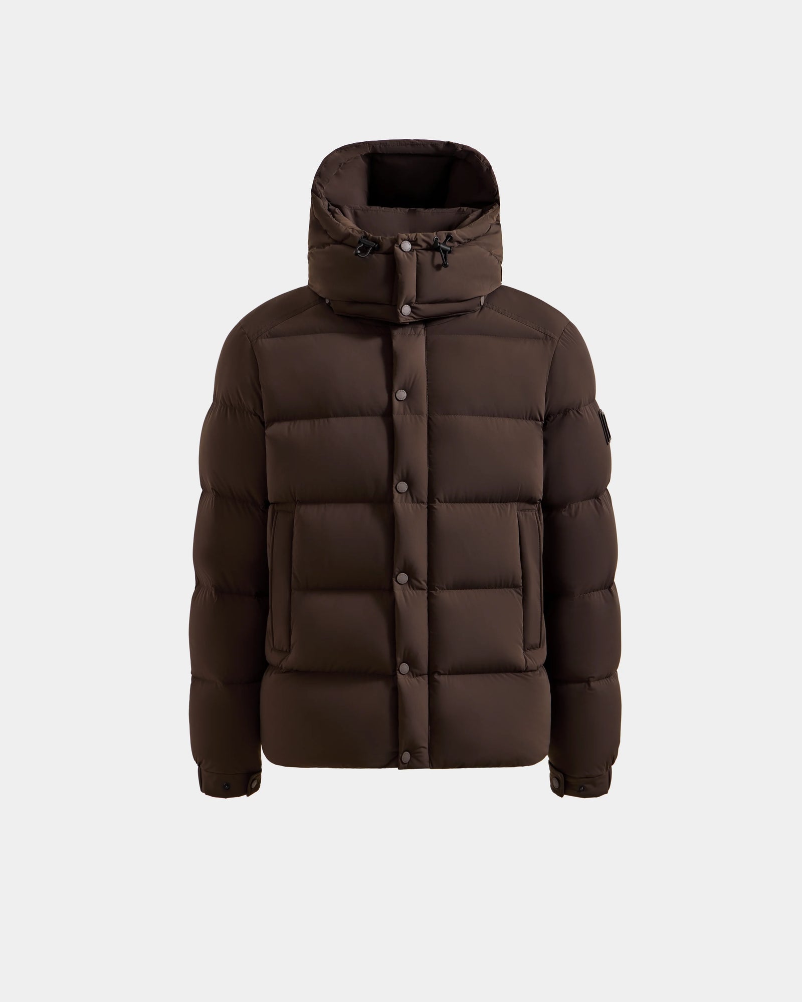 The Rudsak BRAYDEN M-S - M125524 Espresso is a men’s brown down puffer jacket with a hood, front snap buttons, side pockets, and a quilted design with RDS-certified down, shown on a plain light background.