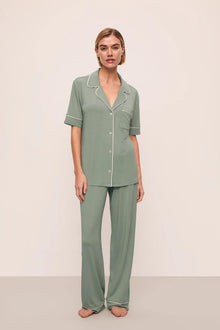 Model is wearing Gisele TENCEL Modal Short Sleeve & Pant PJ Set in Eucalyptus/Ivory