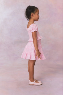 Pink gingham three tiered ruffle skirt, with elastic waistband for girls.