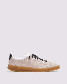 Side angle of light pink and black sneakers
