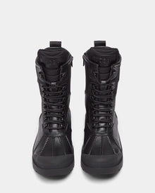 The Rudsak DAMIEN - M222500 Black men’s winter boots feature a black lace-up design, weather-treated leather, high tops, sturdy soles, and visible stitching, shown upright and facing forward on a plain white background.