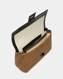 The Rudsak ESMA - 8324519 Camel is a brown suede leather handbag with a flap, cream interior, zippered pocket, leather trim, and removable shoulder strap.