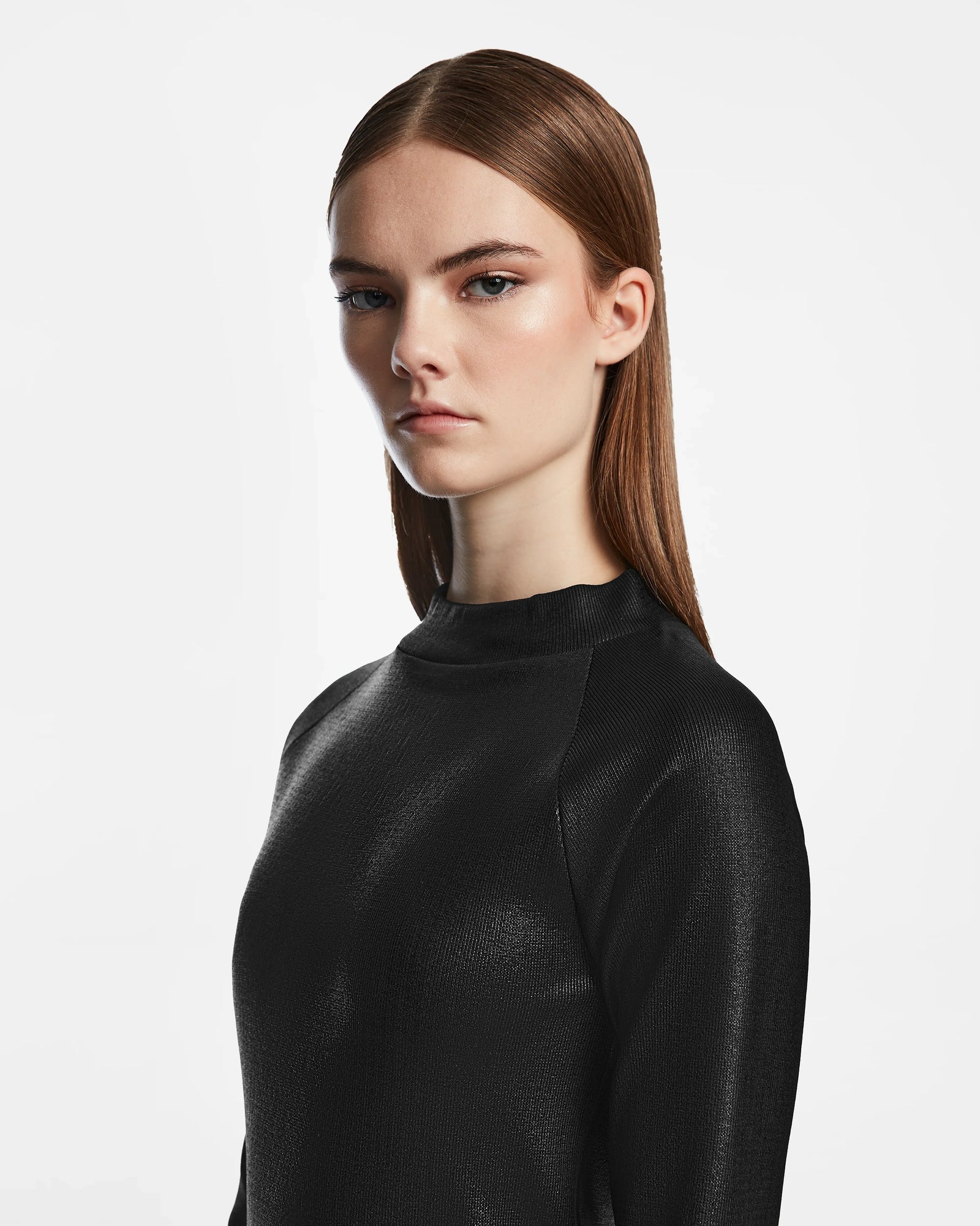 The FAIZA - 8524579 Black by Rudsak is a glossy, polished maxi mock-neck dress that exudes contemporary style.