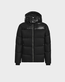 The Rudsak JACK - M124507 Black is a black quilted winter jacket with a hood, offering classic puffer style and warmth.