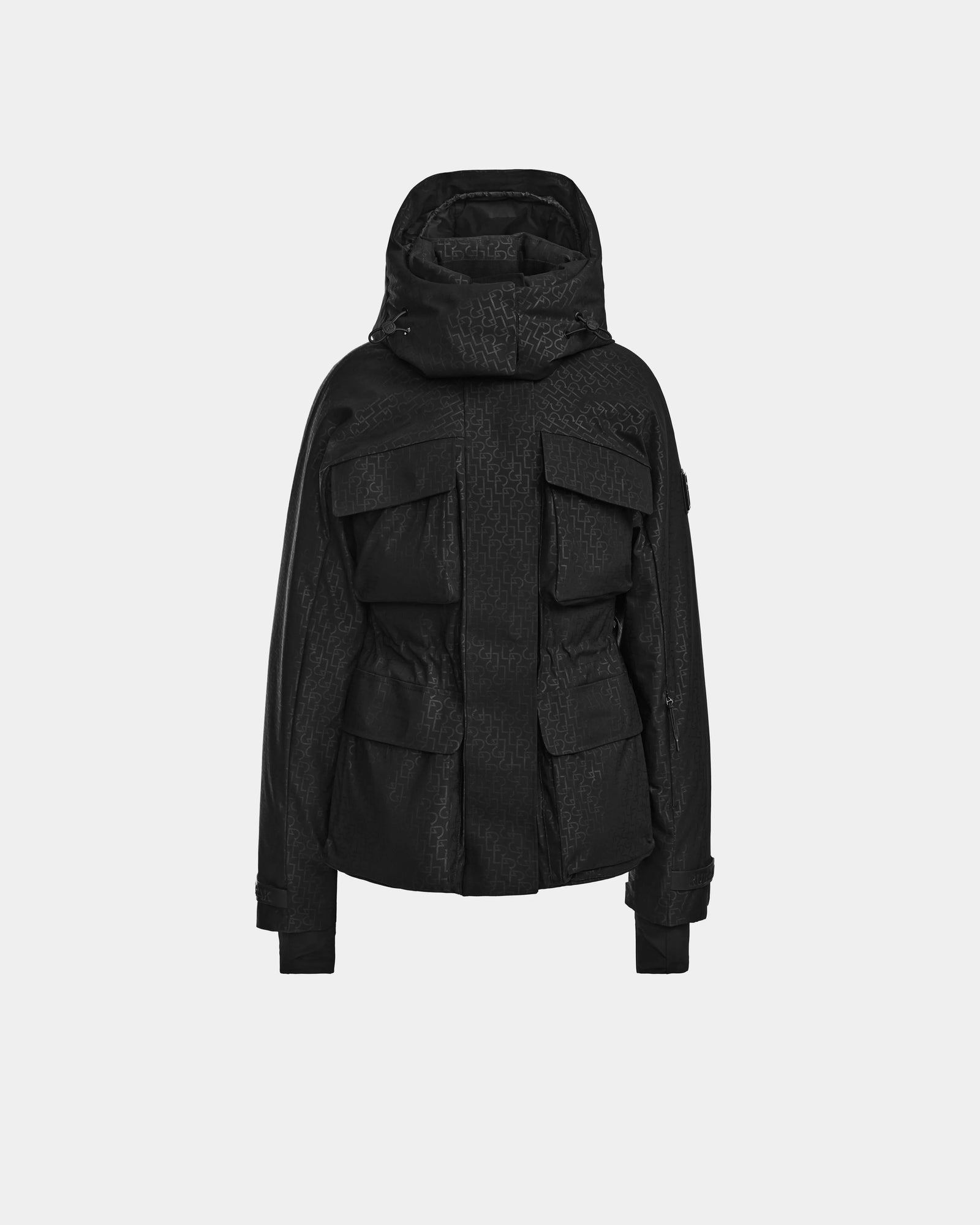 Rudsak LUX MO - 8124570 Monogram Print Black women’s ski jacket features a high collar, multiple front flap pockets, and a belted waist, shown on a plain light gray background.