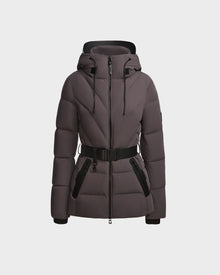 The Rudsak ENZAH - 8124692 Grey is a women's dark gray down puffer jacket with a hood, black belt, and zippered pockets, filled with RDS-certified down. Displayed on a plain white background.