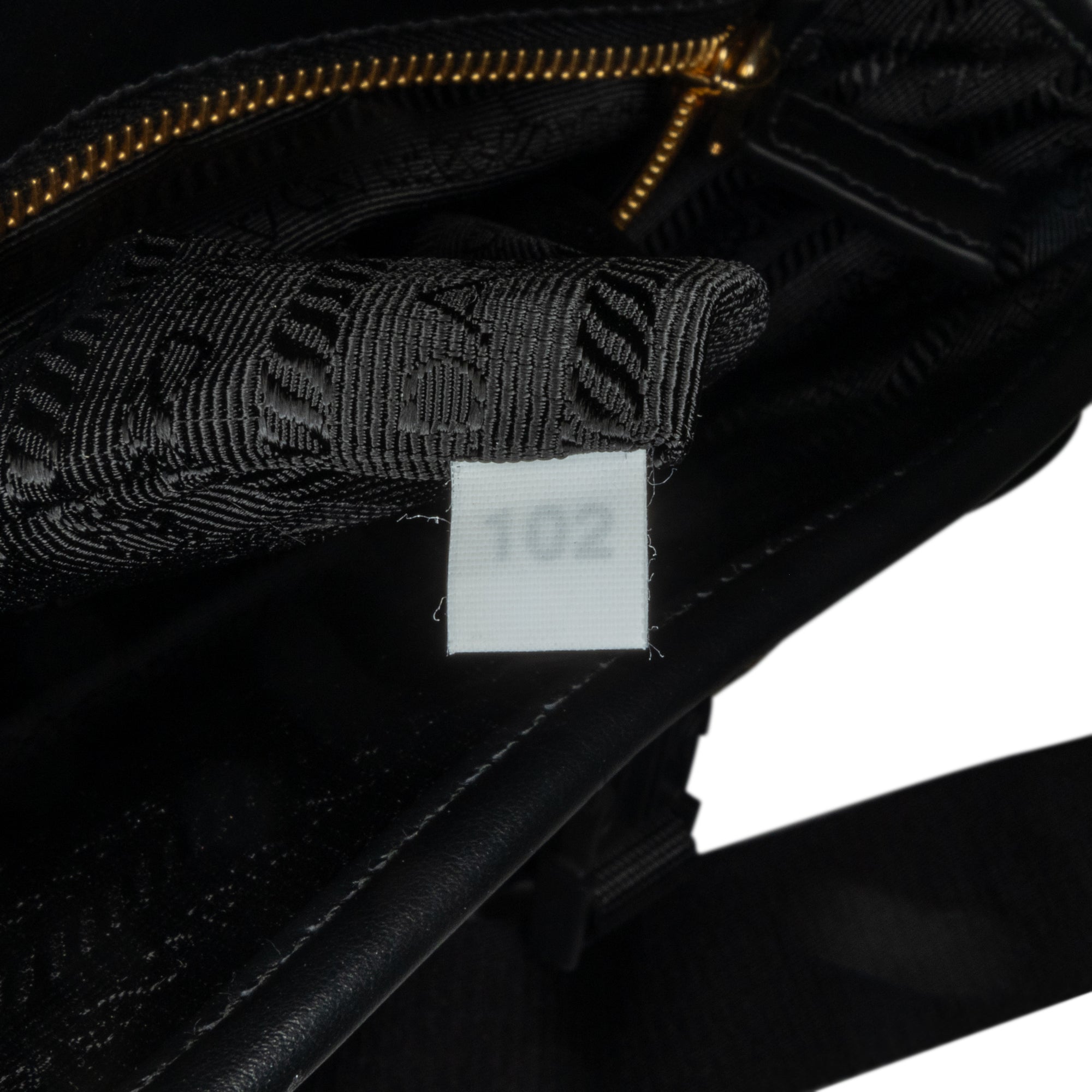 Prada | Pre-Owned Symbole Double Buckle Messenger Bag | Brown