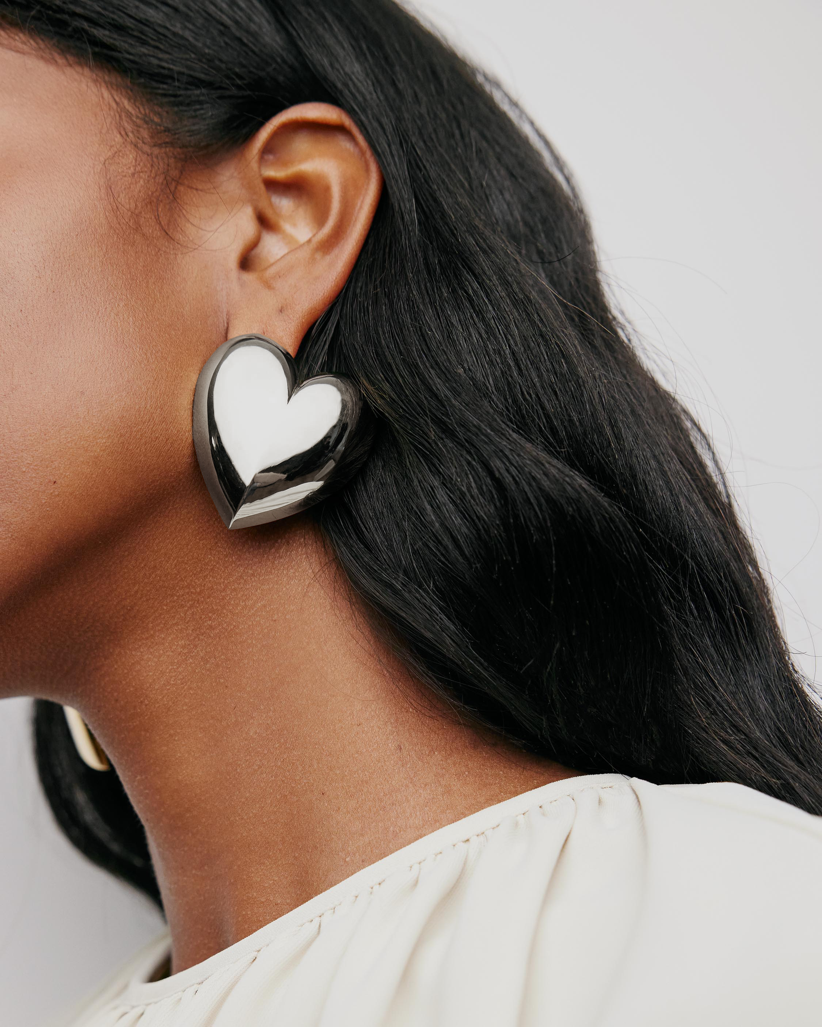 Puffy Heart Earrings earring - side view | womens gold earrings