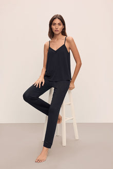 Model wears Fiona TENCEL Modal Cami & Pant PJ Set in black.