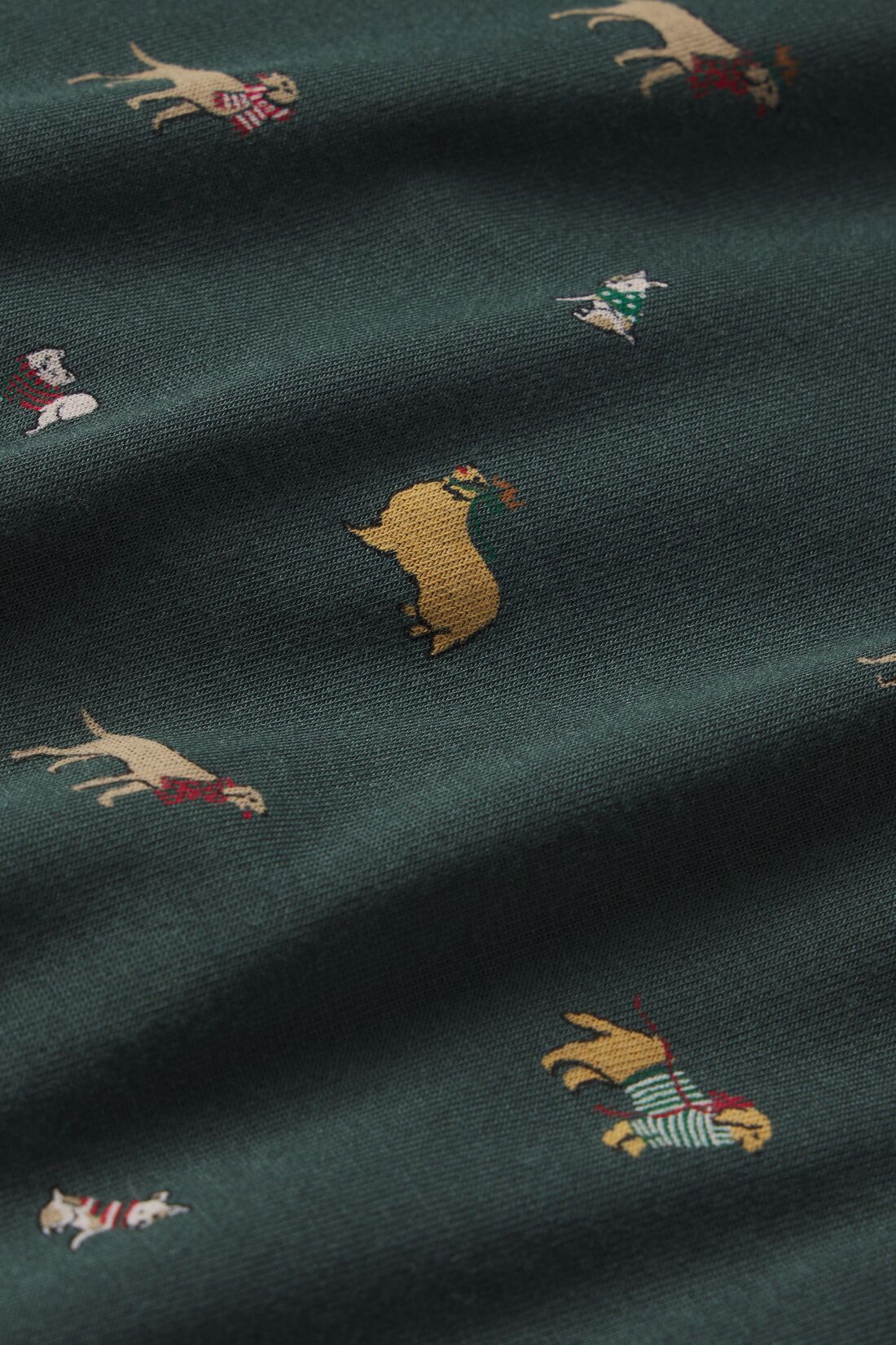 Fabric detail shot of Holiday Dogs Pine