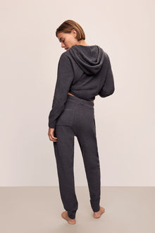 Model in Recycled Boucle Women's Hoodie and Jogger in Graphite