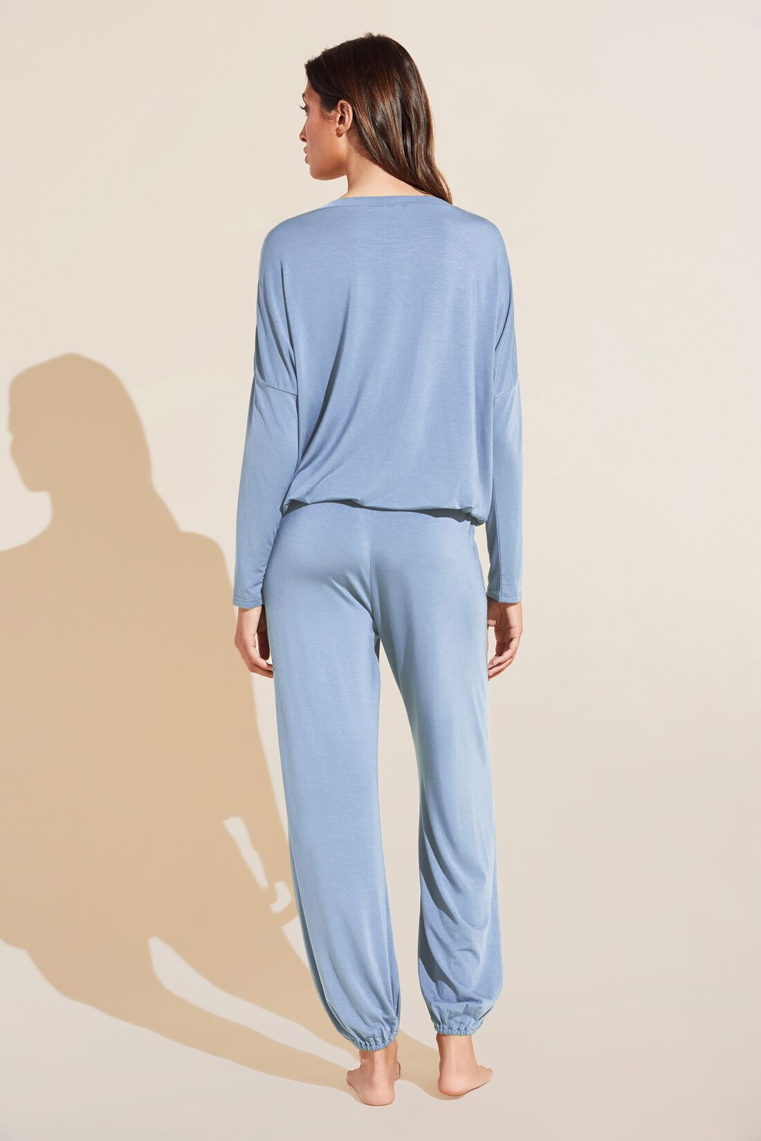 Model wears Gisele TENCEL Modal Slouchy PJ Set in wedgewood blue/ivory.