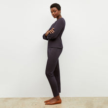 Front image of a woman wearing the rashida top in navy multi