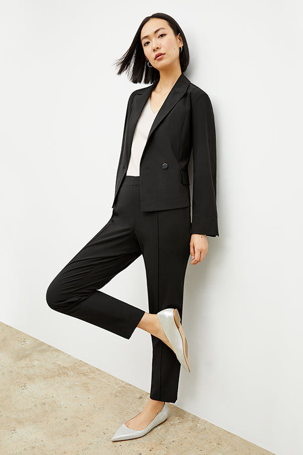Front image of a woman standing wearing the Colby Jogger in Black | Exclude