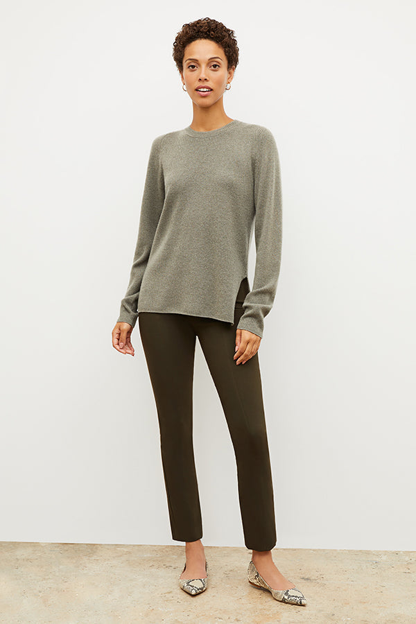 front image of woman wearing foster pant in dark olive | Exclude