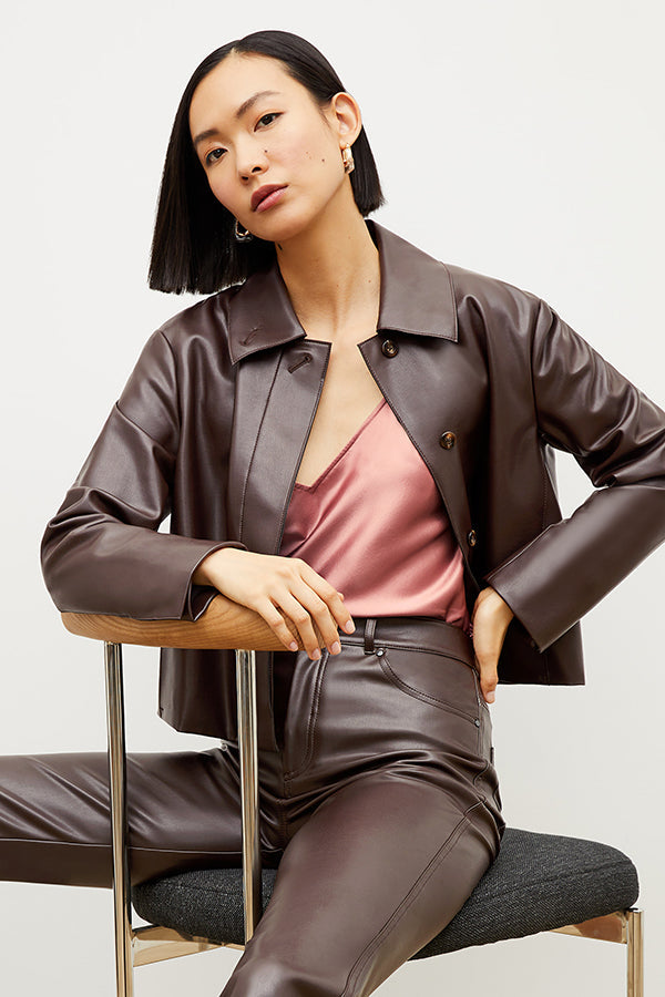 Front image of a woman wearing the nicky jacket in brown | Exclude