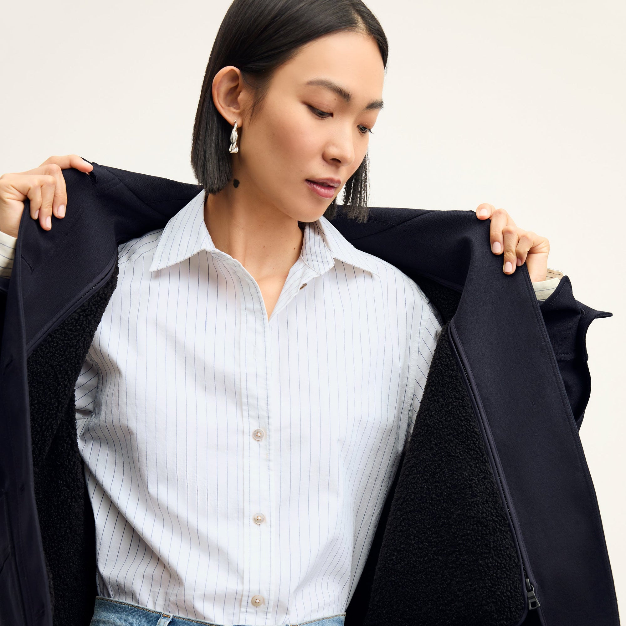 Front image of a woman wearing the Mila Button Down - Poplin Stripe in Blue / Ivory