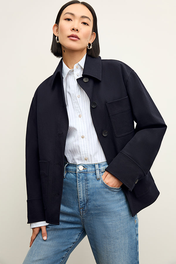 Front image of a woman wearing the Mila Button Down - Poplin Stripe in Blue / Ivory | Exclude