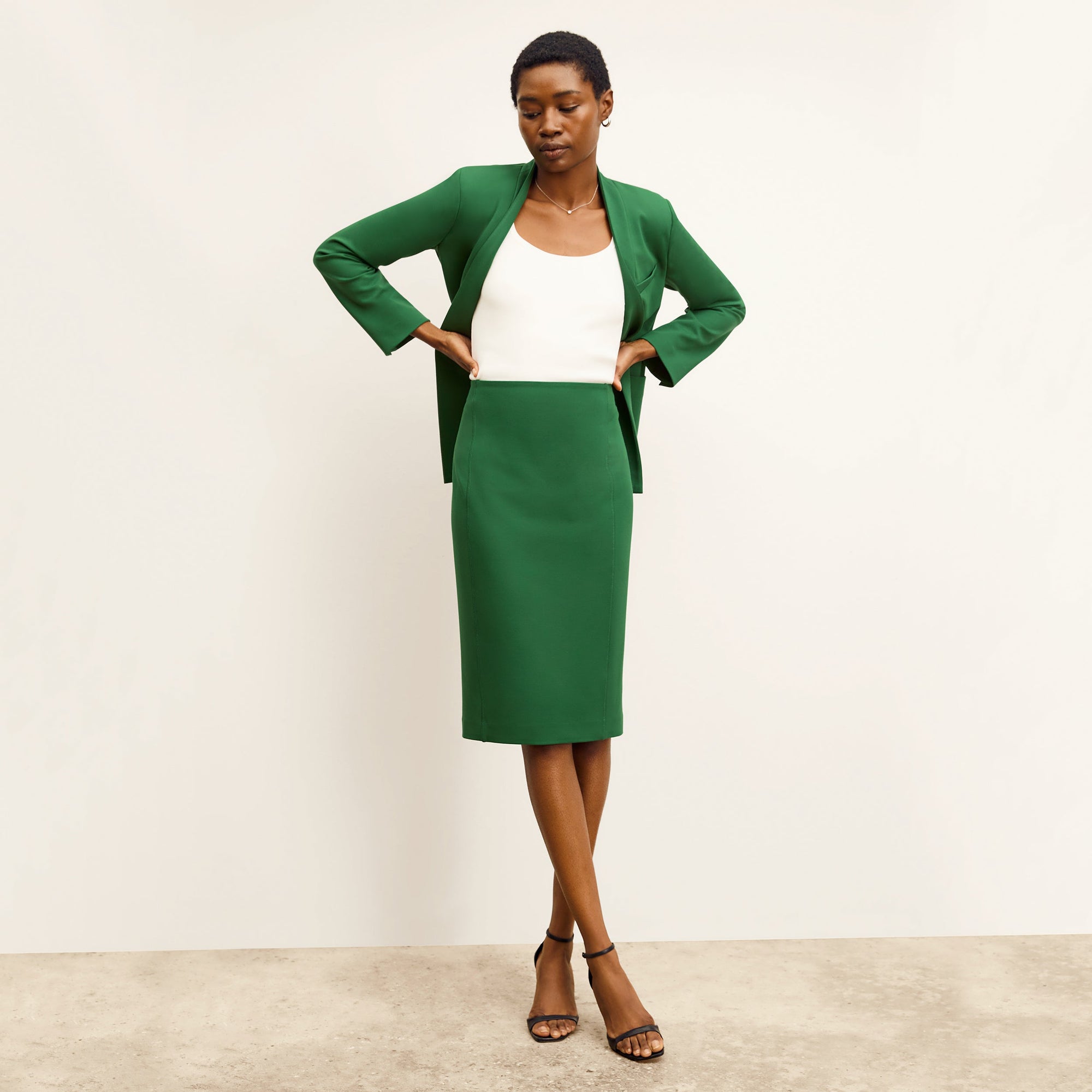 front image of a woman wearing the janette jacket in shamrock 