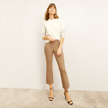 Front image of a woman wearing the Kick Flare Foster pant