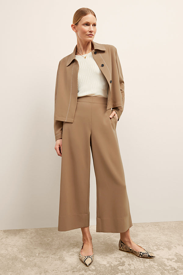 front image of a woman wearing the nicky jacket in saddle | Exclude