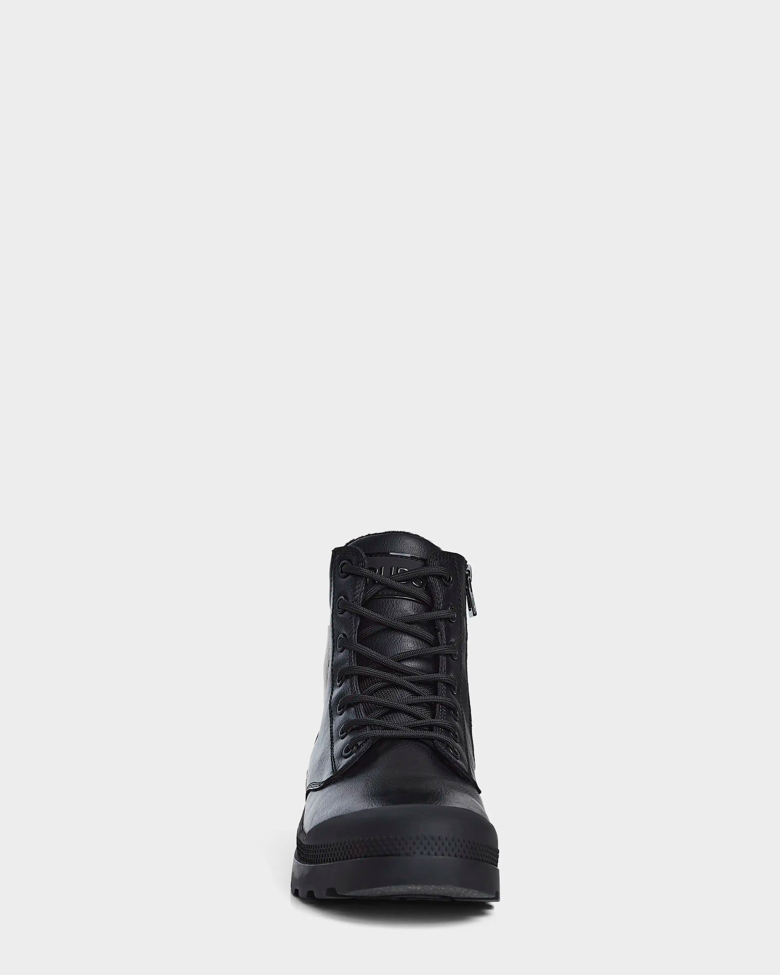The Rudsak ARTUR - M223501 Black men's ankle boot is shown from the front against a white background, featuring weather-treated leather, a rugged sole, smooth finish, visible laces, and seams.