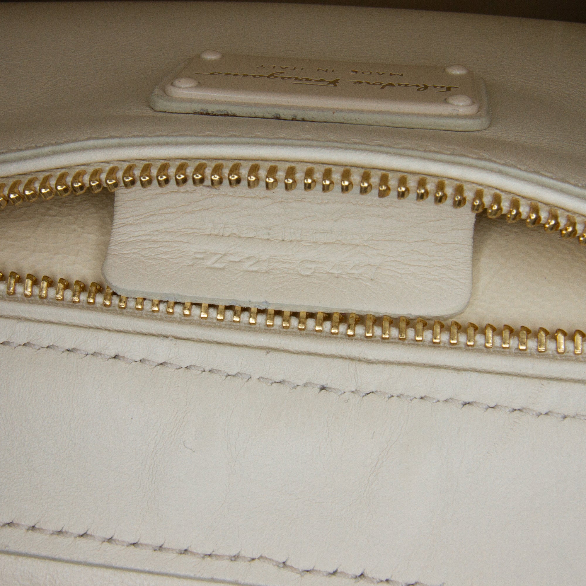 Ferragamo | Pre-Owned Leather Laser Cut Gancini Sofia | White