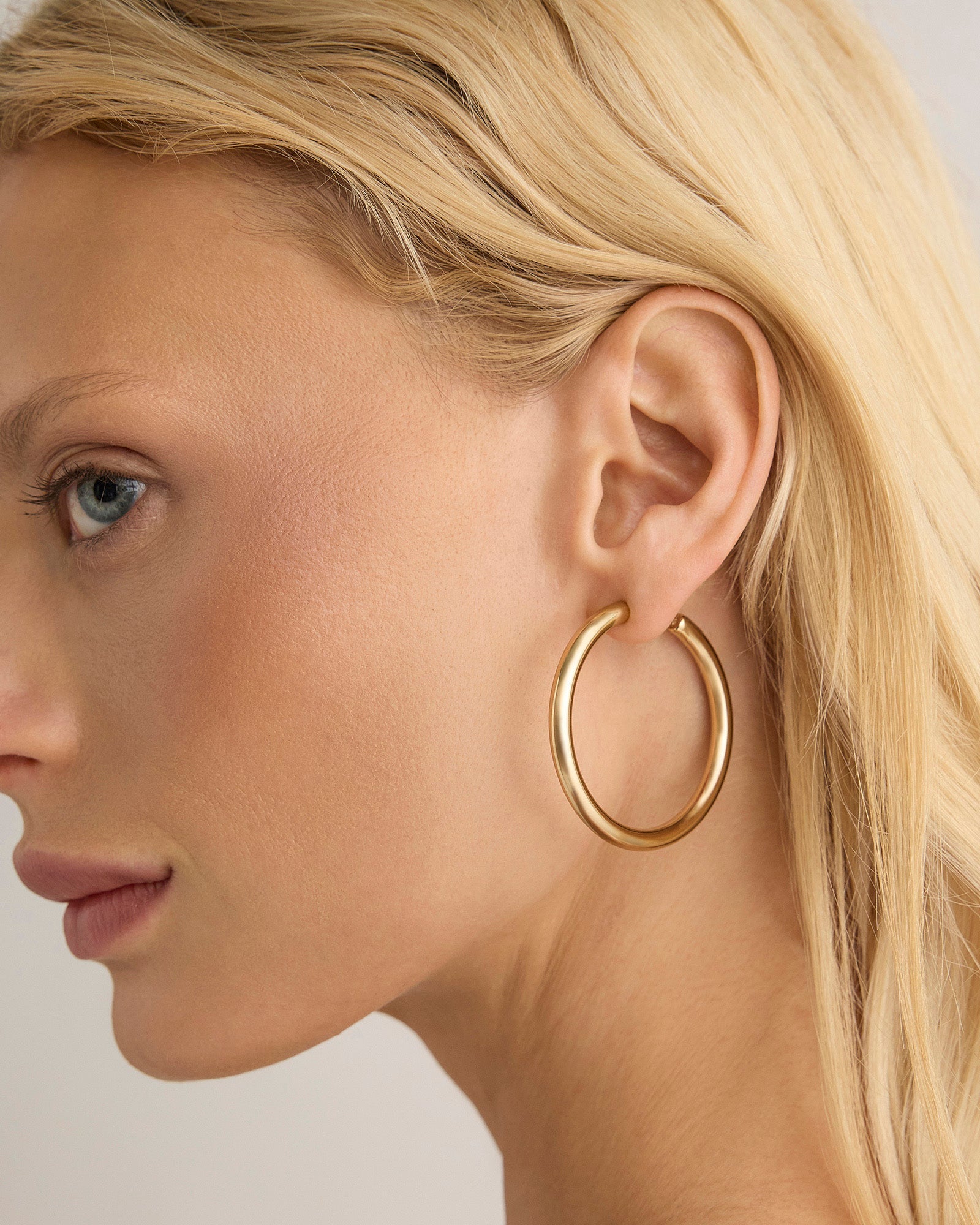 1.5" Natasha Baby Hoops earring - close-up detail | gold hoop earrings