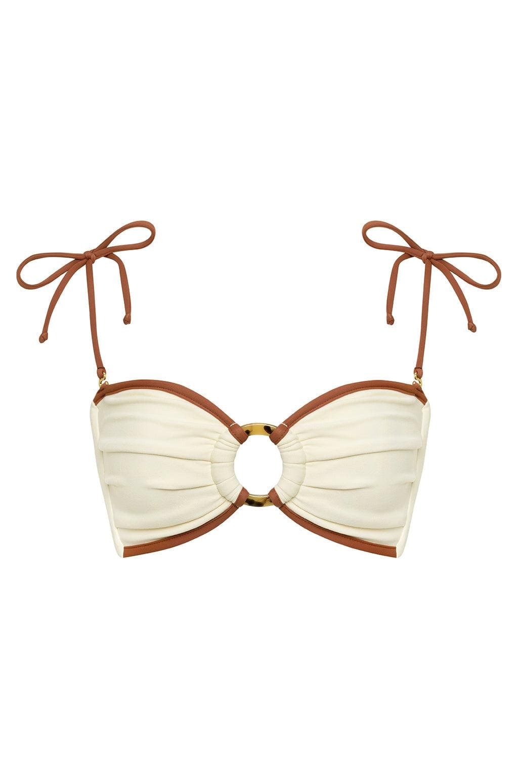 Oat and terracotta bandeau bikini top with ruched fabric, cutout center, tortoiseshell ring detail, and tie shoulder straps.
