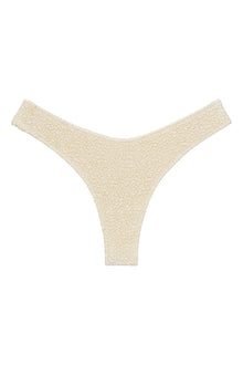 Oat-colored bikini bottom with textured fabric and zig-zag stitching on wide side straps.
