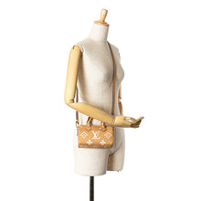 Louis Vuitton | Pre-Owned Monogram Empreinte Nano Speedy | Brown