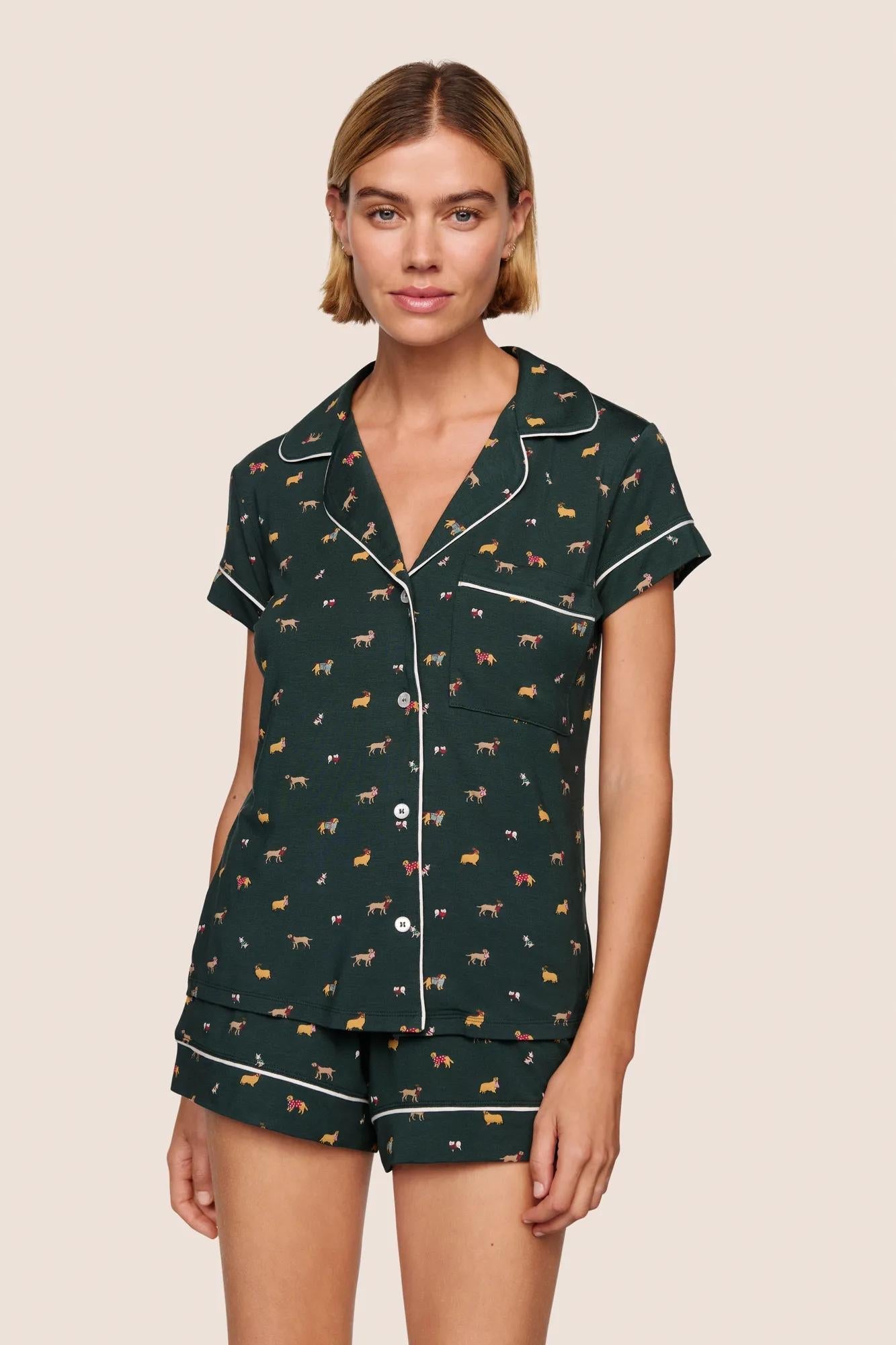 Model is wearing Gisele Printed TENCEL Modal Shortie Short PJ Set  in Holiday Dogs Pine/Ivory