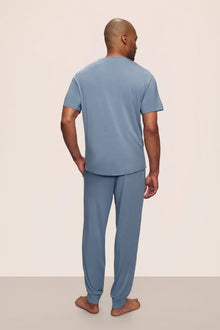 Model is wearing Henry TENCEL Modal Short Sleeve Pant PJ Set in Faded Denim