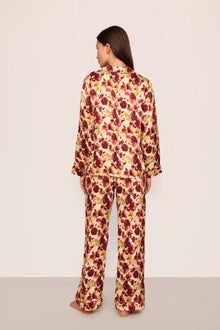 Model is wearing Inez Washable Silk Printed Long PJ Set in Botanical Flower Merlot/Merlot