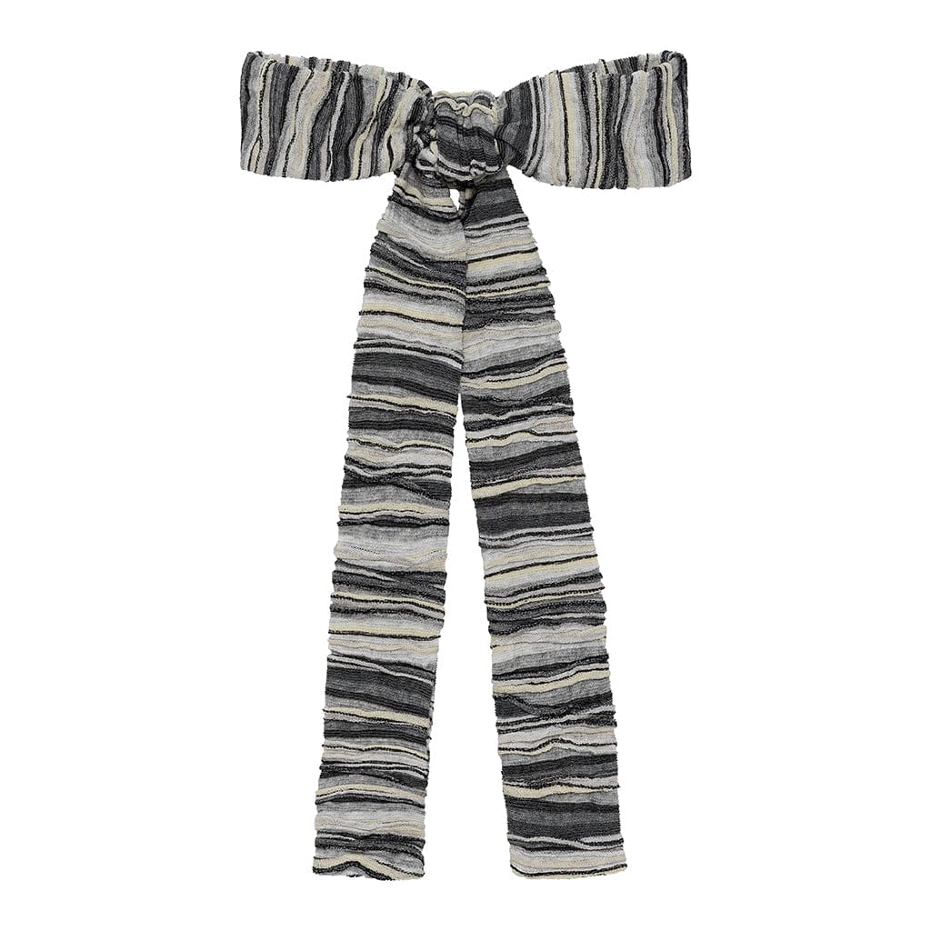 Striped slub knit hair ribbon in black, gray, and cream with a bow knot at the center.