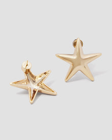 Puffy Star Earrings earring - styled on model | gold earrings for women