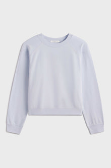 Light blue sweatshirt on a light gray background