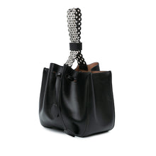 Alaïa | Pre-Owned Calfskin Eyelet Bracelet Embellished Bucket Bag | Black