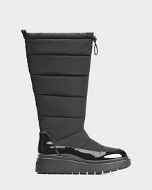 The Rudsak CLAUDE - L223506 Black is a tall women's waterproof quilted winter boot with a shiny patent toe and heel, thick sole, and drawstring closure, shown in side profile against a plain background.
