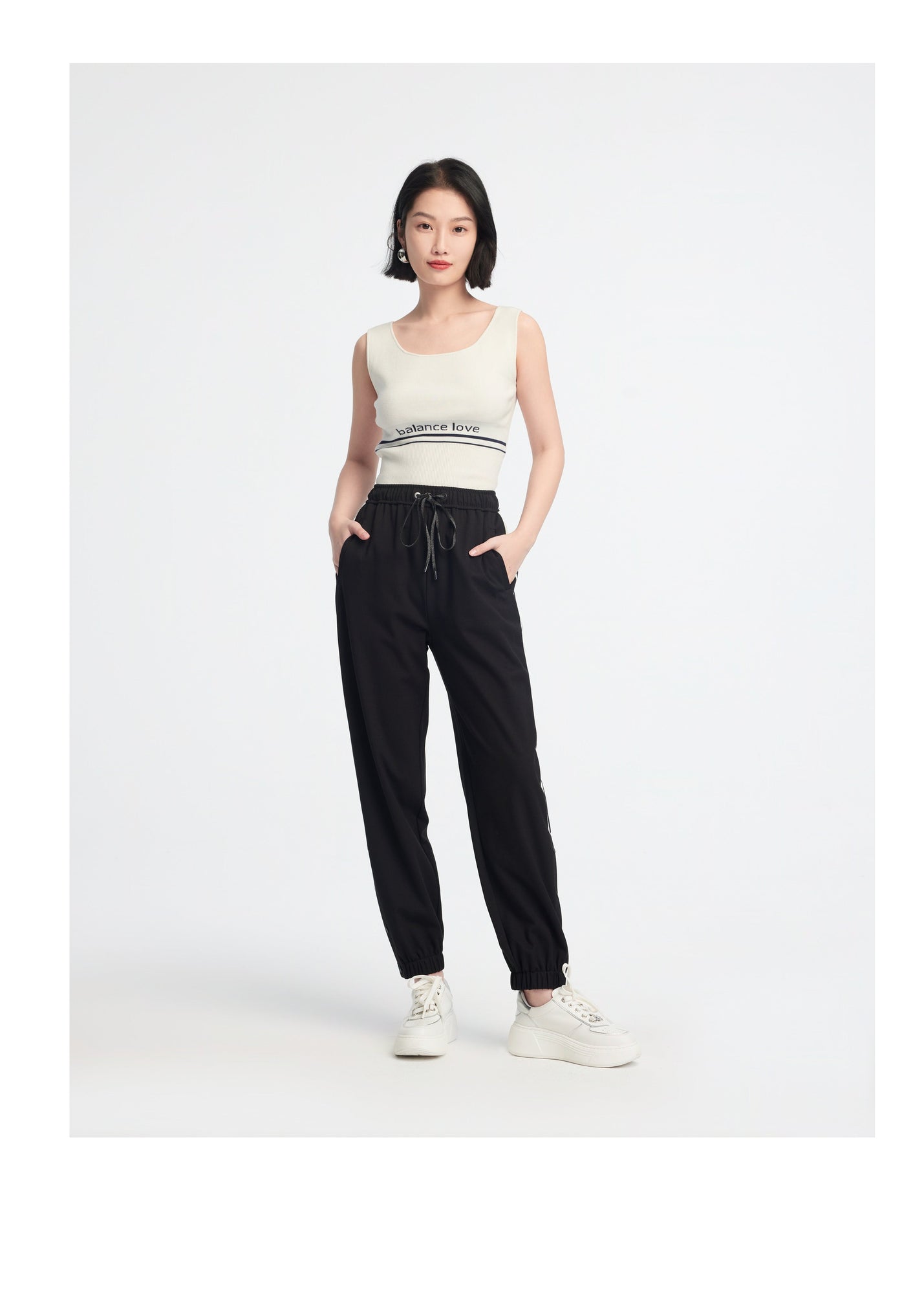 high-waisted tapered pants | Black