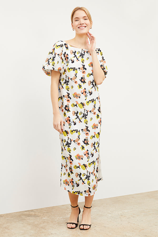 Front image of a woman wearing the Gali dress in meadow print linen | Exclude